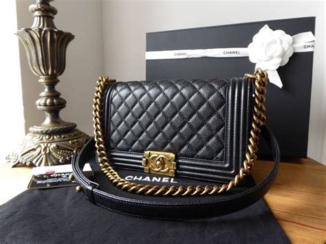 chanel boy bag old medium black gold hardware|Chanel boy bag gold chain.